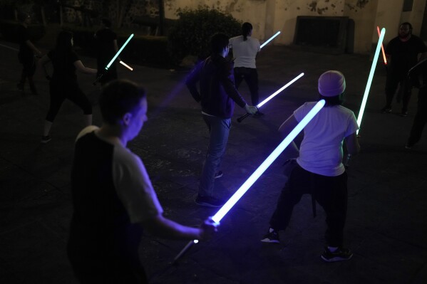 Star Wars fans hone their lightsaber dueling skills at a Mexico City Jedi academy