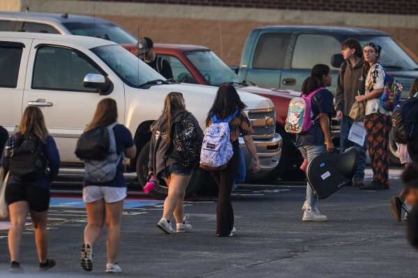 Weeks after a school shooting, students return for classes at Apalachee High School