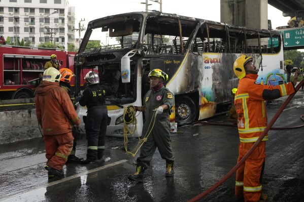 More than 20 are feared dead after a school bus catches fire in suburban Bangkok