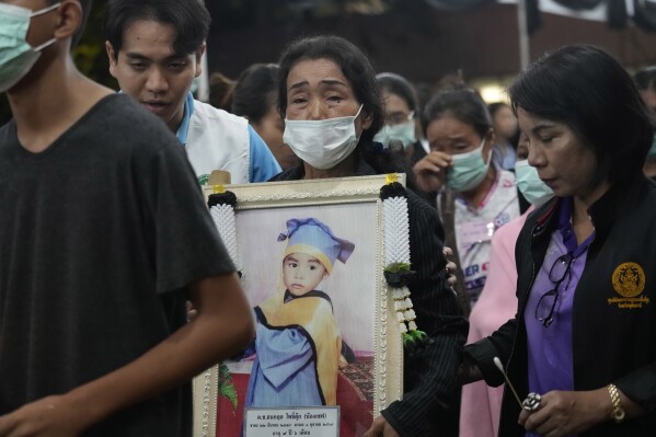 Bodies of the children and teachers who died in a Thai school bus fire return home for funeral