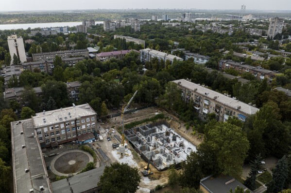 Radiation and Russian bombs threaten this Ukrainian city, so it’s building schools underground