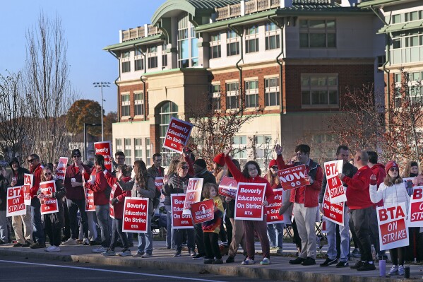 Teachers in 2 Massachusetts school districts go on strike